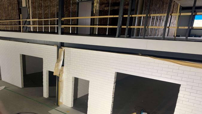 Afbeelding voor: Medewerkers van Vistapaint schilderen de nieuwe kluizen Afbeelding voor: Medewerkers van Vistapaint schilderen de nieuwe kluizen